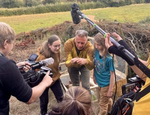 Us being filmed by ITV & BBC news & Devon Live and a Guardian photographer